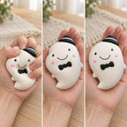 Ghost squishy halloween (white), squished flat, half risen and fully back in shape