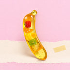 Giant banana squishy – Giant Banana Squishy, Jumbo Slow Rising, product photo on pastel paper