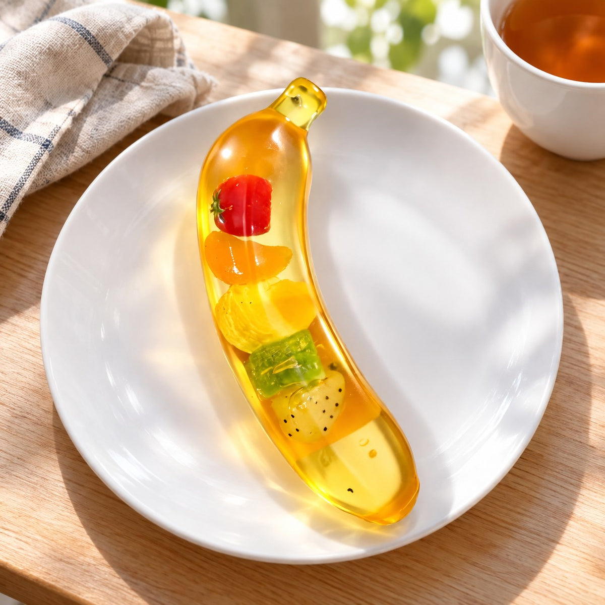 Giant Banana Squishy, Jumbo Slow Rising, on a plate on a breakfast table