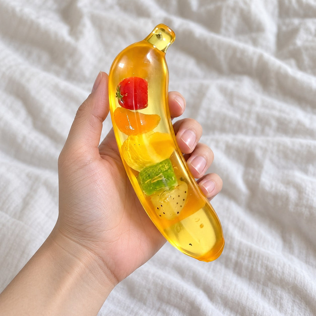 Giant banana squishy, held toward the camera, first-person view