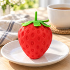 Giant Strawberry Squishy, Jumbo Slow Rising, on a plate on a breakfast table