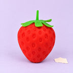 Giant strawberry squishy – Giant Strawberry Squishy, Jumbo Slow Rising, product photo on pastel paper