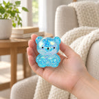 Glitter Bear Squishy, Maltose Jelly, 3 Sizes, held in a hand to show the real size