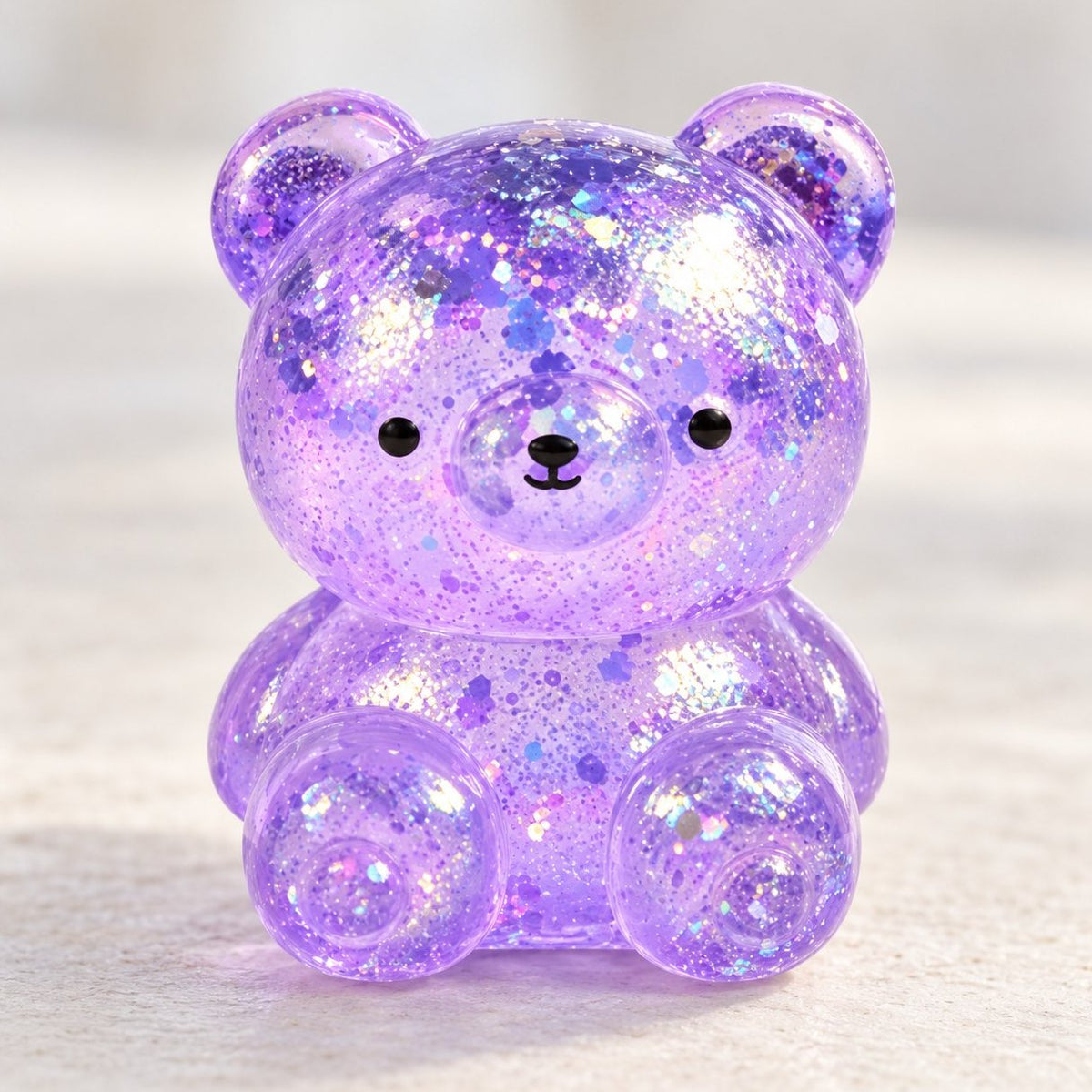 Glitzer Bär Squishy aus Maltose ganz nah, man sieht jedes Glitzerteilchen