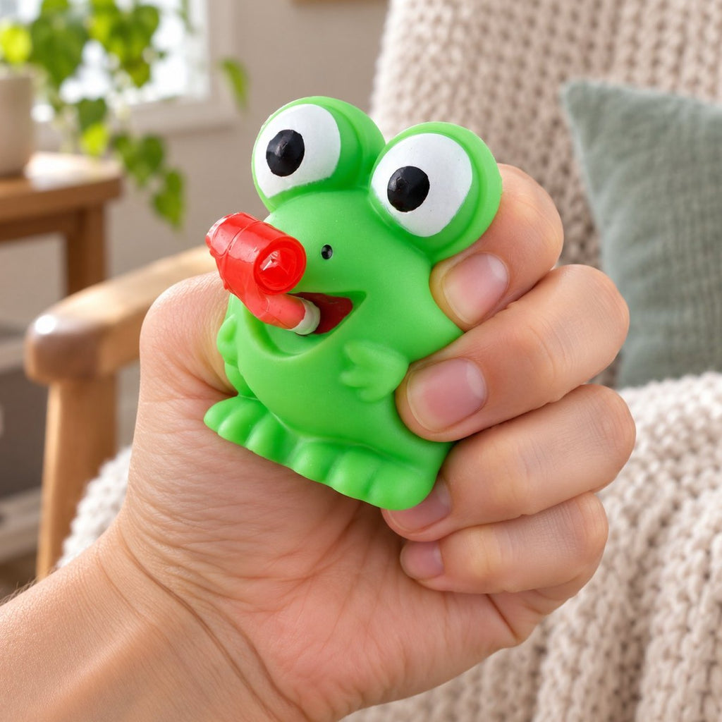 Gniotek żaba lub dino: ściskana żabka wystawia język