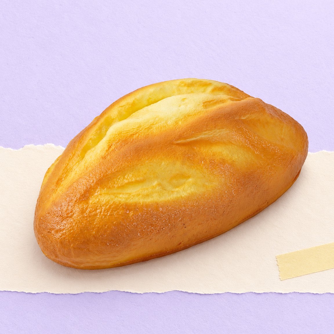 Haferbrot Squishy, rustikaler Brotlaib mit 18 cm, auf Pastellpapier