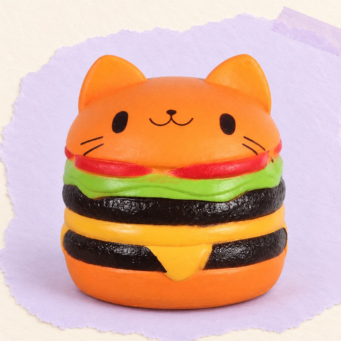 Oranje hamburger squishy met kat, jumbo, op pastelkleurig papier