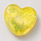 Glitter Heart Squishy, Maltose Style 6.7 cm (yellow), close-up of the glitter