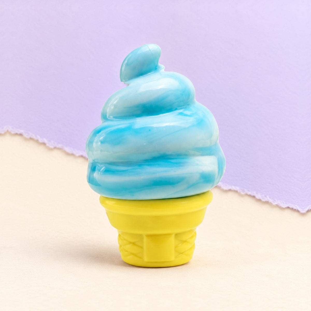 Ice cream squishy stretchy – Ice Cream Cone Squishy, Stretchy Silicone (Blue), product photo on pastel paper
