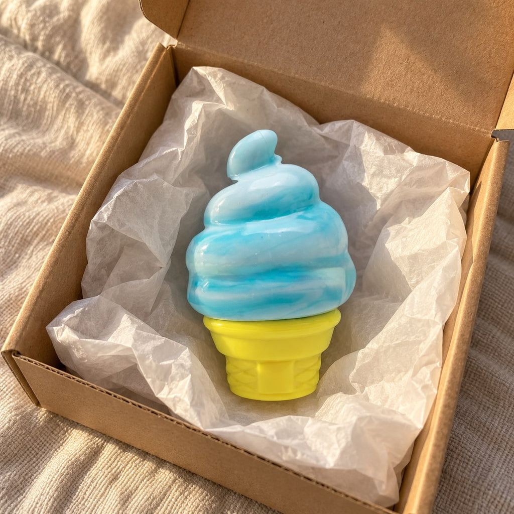 Ice cream cone squishy (blue), unboxed from a parcel with tissue paper