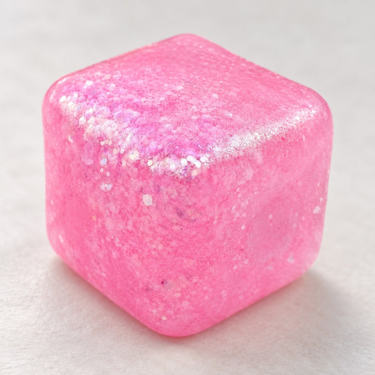 Ice Cube Squishy, 5 cm, Snowflake, Marble or Glitter (pink glitter), close-up of the glitter