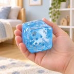 Ice Cube Squishy, 5 cm, Snowflake, Marble or Glitter, held in a hand to show the real size