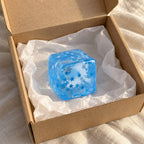 Ice cube squishy jelly (snowflake), unboxed from a parcel with tissue paper