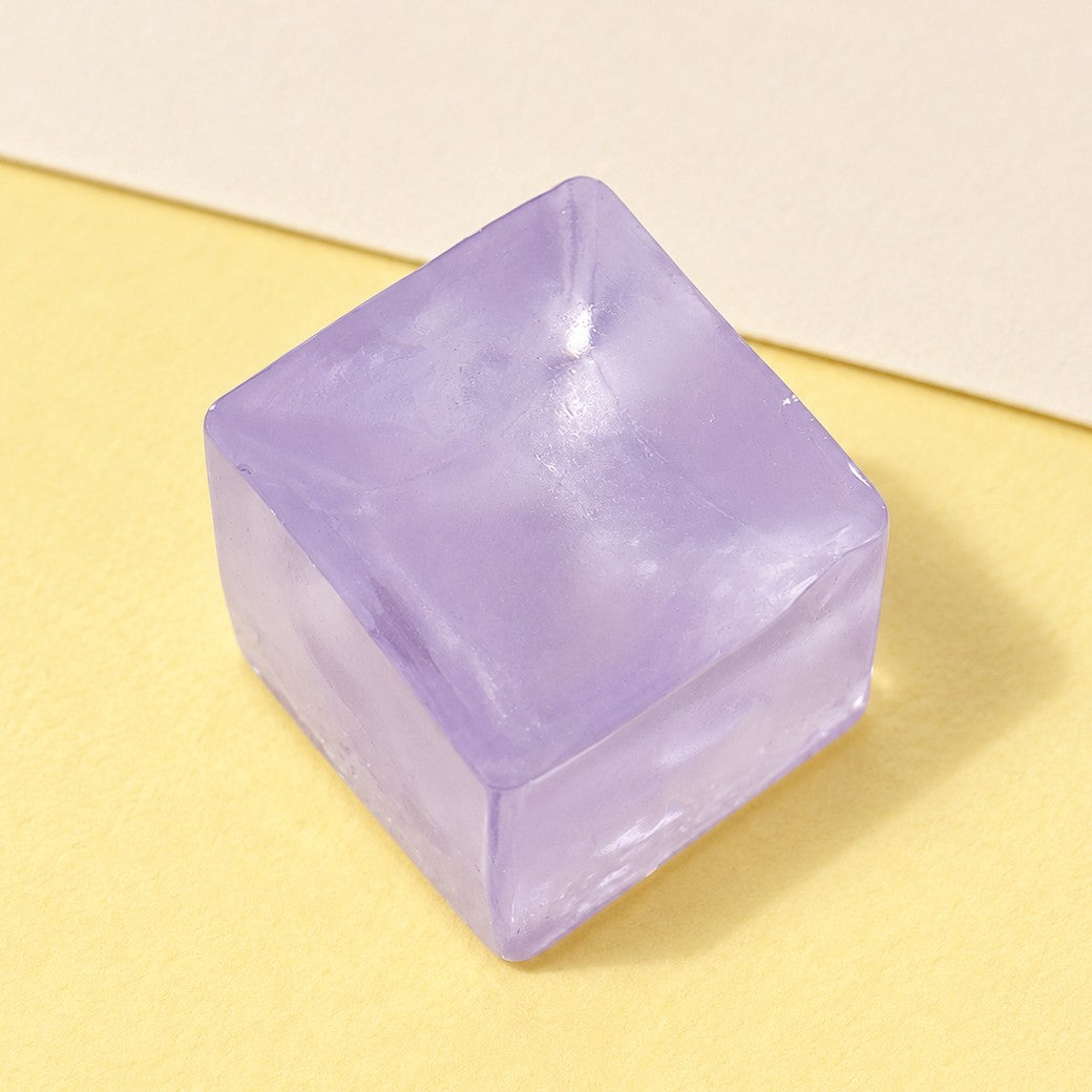 Ice cube squishy mini jelly – Mini Jelly Ice Cube Squishy, 2.5 cm (Purple), product photo on pastel paper