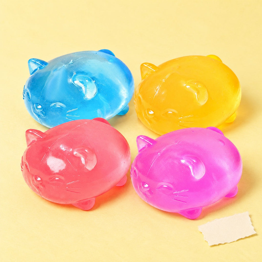 Jelly cat squishy set maltose – Jelly Cat Squishy, all 4 colors, product photo on pastel paper