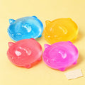 Jelly cat squishy set maltose – Jelly Cat Squishy, all 4 colors, product photo on pastel paper