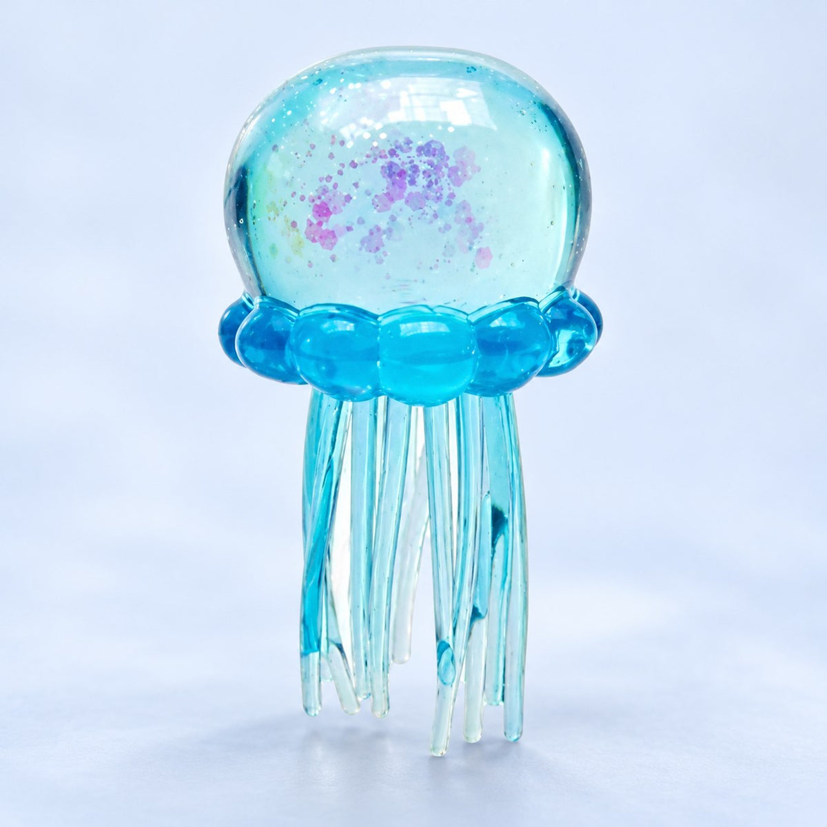 Jellyfish Squishy with Glitter, Soft TPR (blue), close-up of the glitter