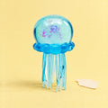 Jellyfish squishy with glitter – Jellyfish Squishy with Glitter, Soft TPR (Blue), product photo on pastel paper