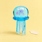 Jellyfish squishy with glitter – Jellyfish Squishy with Glitter, Soft TPR (Blue), product photo on pastel paper