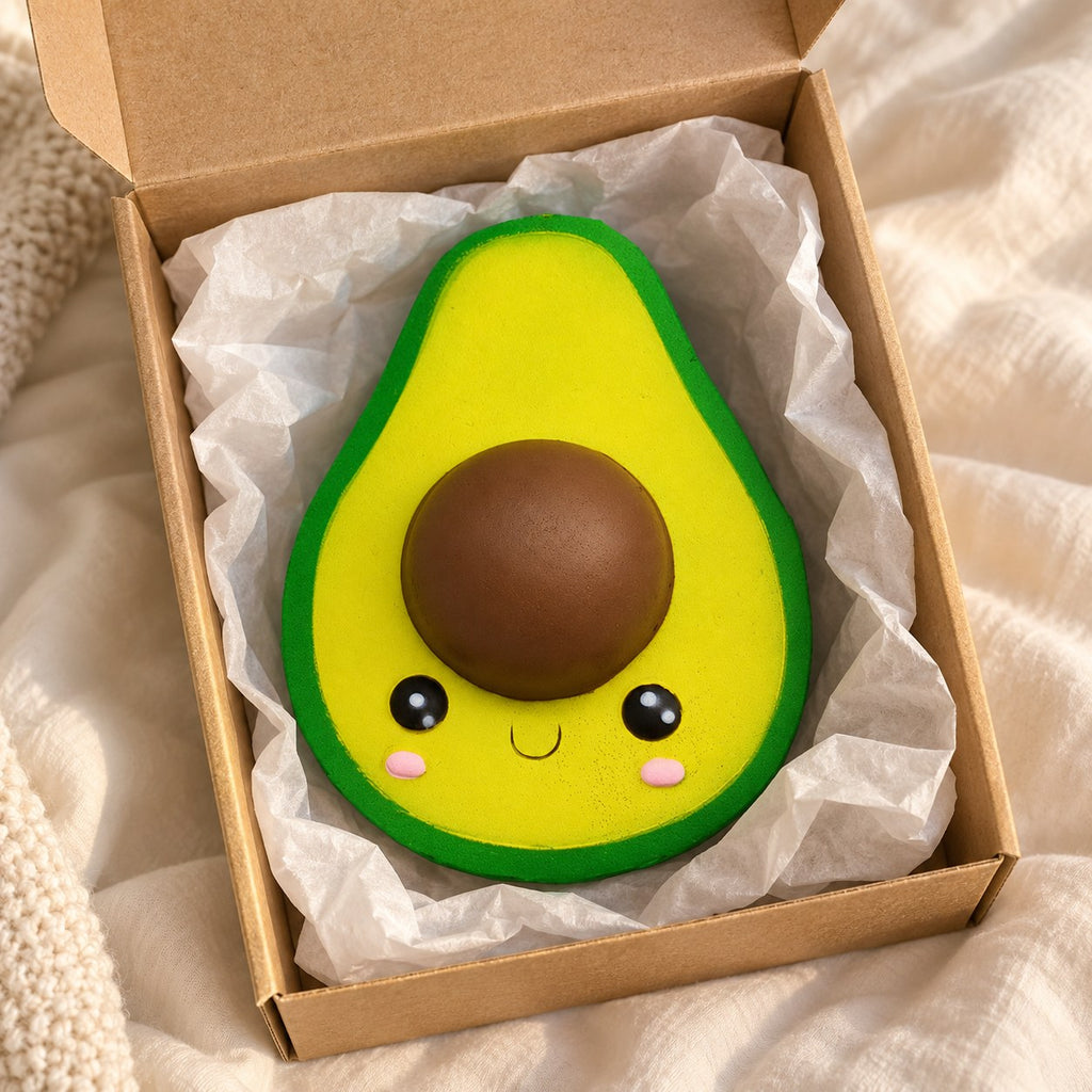 Avocado squishy, unboxed from a parcel with tissue paper