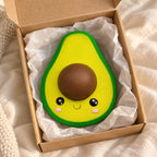 Avocado squishy, unboxed from a parcel with tissue paper