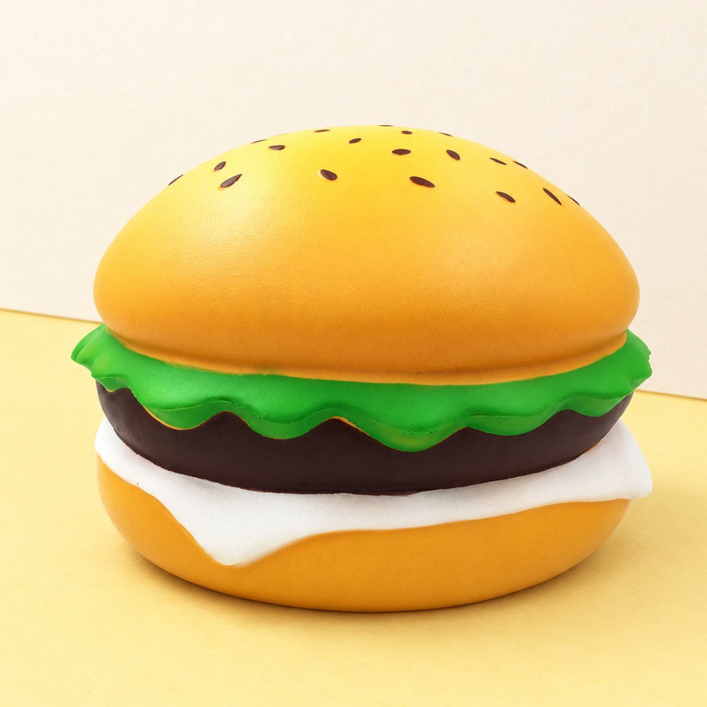 Jumbo Burger Squishy, Riesen-Sesamburger mit 24 cm, auf Pastellpapier
