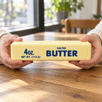Jumbo Butter Squishy, Giant Butter Stick 24 cm, held in both hands to show the big size