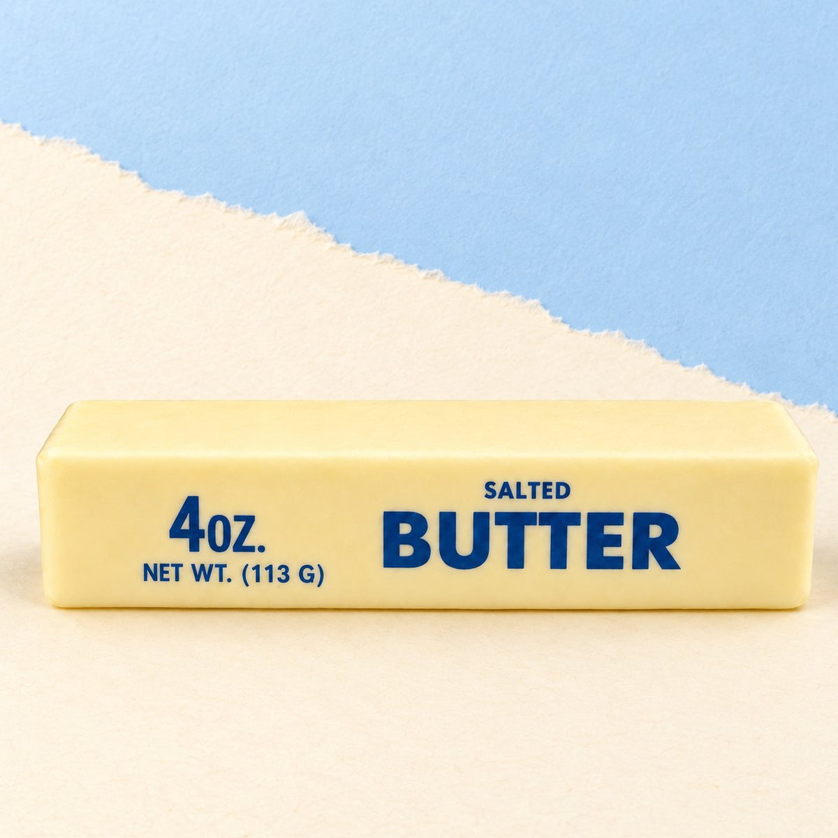 Jumbo Butter Squishy, Riesen-Butterstange mit 24 cm, auf Pastellpapier