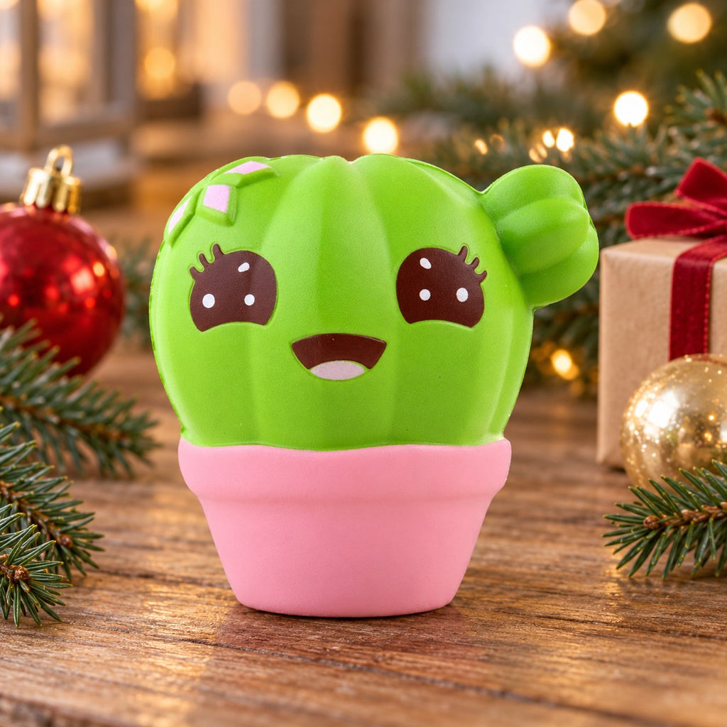Jumbo Cactus Squishy, Kawaii, in a Christmas scene with fir branches and fairy lights