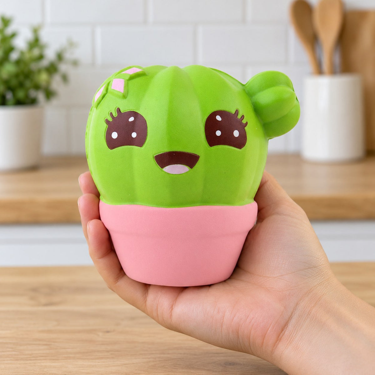 Jumbo Cactus Squishy, Kawaii, held in a hand to show the real size