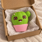 Cactus squishy, unboxed from a parcel with tissue paper