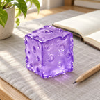 Cheese squishy jumbo (purple), on a desk with a notebook and pencil