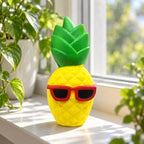 Jumbo Pineapple Squishy with Sunglasses, on a sunny windowsill