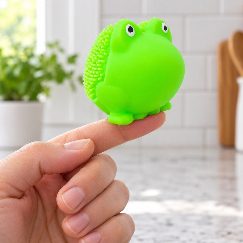 Op een vingertop: zachte kikker squishy, zo klein is hij