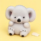 Koala squishy fuzzy soft tpr, product photo on pastel paper