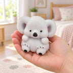 Koala Squishy, Fuzzy Soft TPR, held in a hand to show the real size