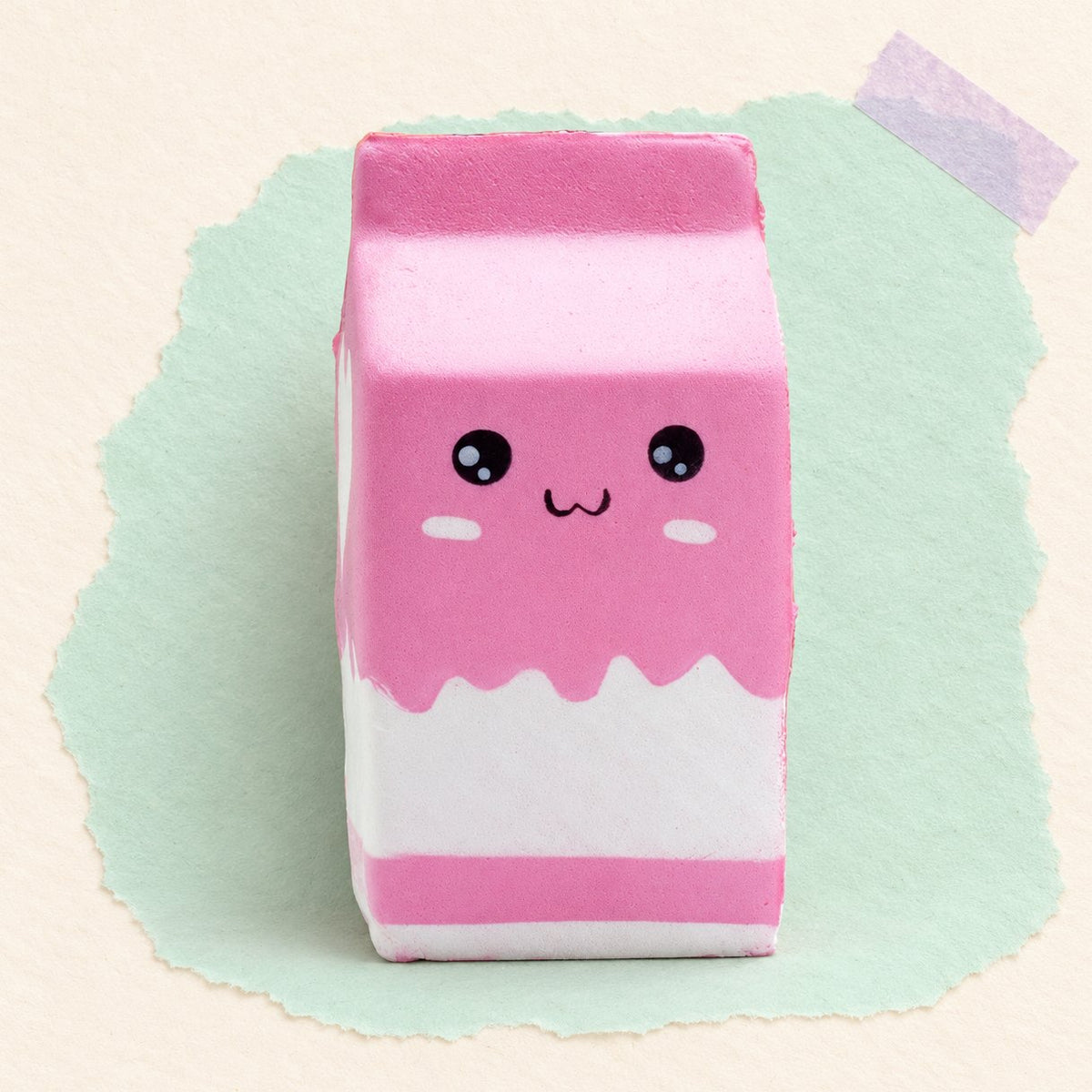 Milchkarton Squishy in Rosa, XXL und Slow Rising, Produktfoto auf Pastellpapier