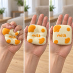 Milk squishy kawaii, squished flat, half risen and fully back in shape