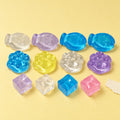 Mini mix squishy jelly – Mini Jelly Squishy Mix, 12 pieces, product photo on pastel paper