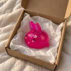 Bunny squishy mochi, unboxed from a parcel with tissue paper
