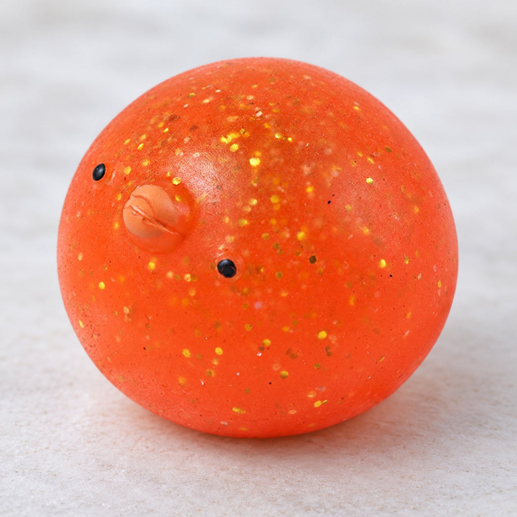 Mochi Squishy Chick with Glitter, close-up of the glitter