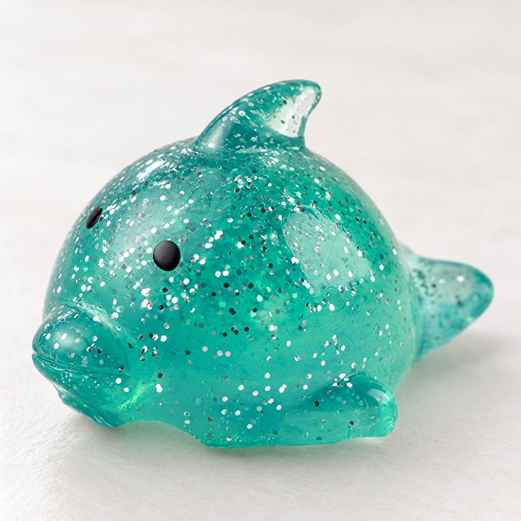 Big Mochi Squishy Dolphin with Glitter, close-up of the glitter