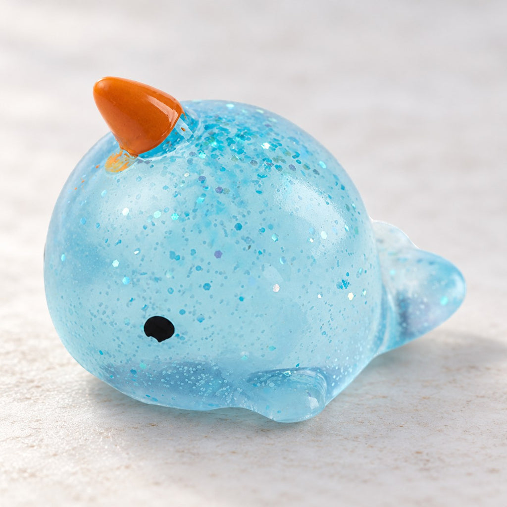 Mochi Squishy Narwhal with Glitter, close-up of the glitter