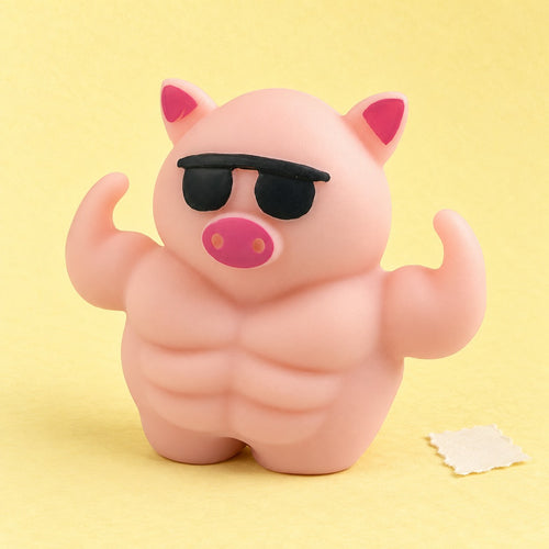 Pig squishy – Muscle Pig Squishy with Sunglasses, 12.5 cm, product photo on pastel paper