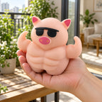 Muscle Pig Squishy with Sunglasses, 12.5 cm, held in a hand to show the real size