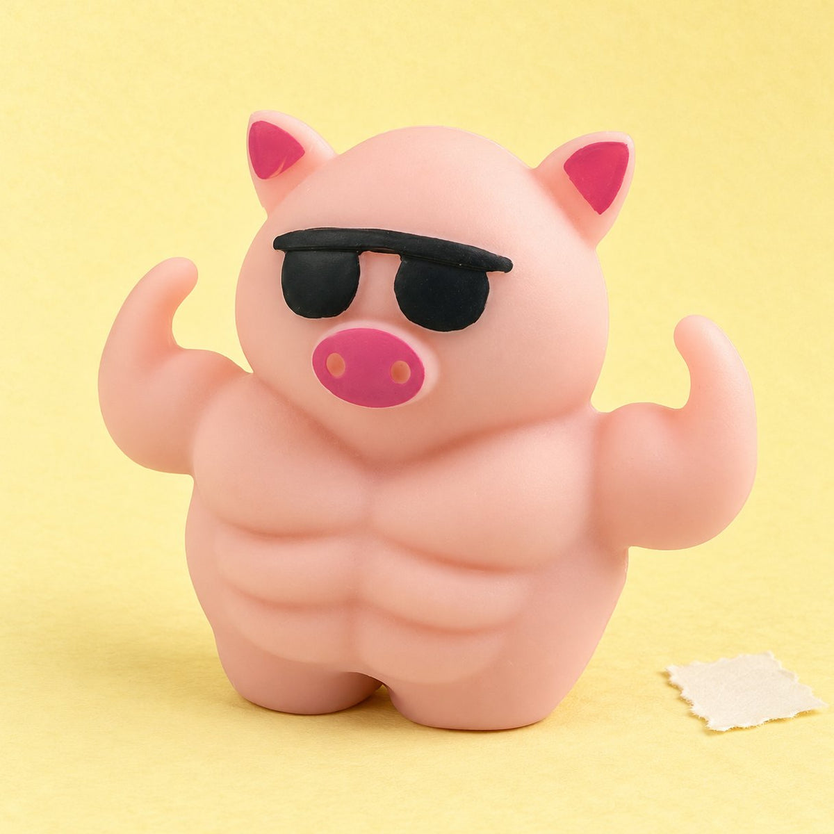 Muskelschwein Squishy mit Sonnenbrille, 12,5 cm, auf Pastellpapier