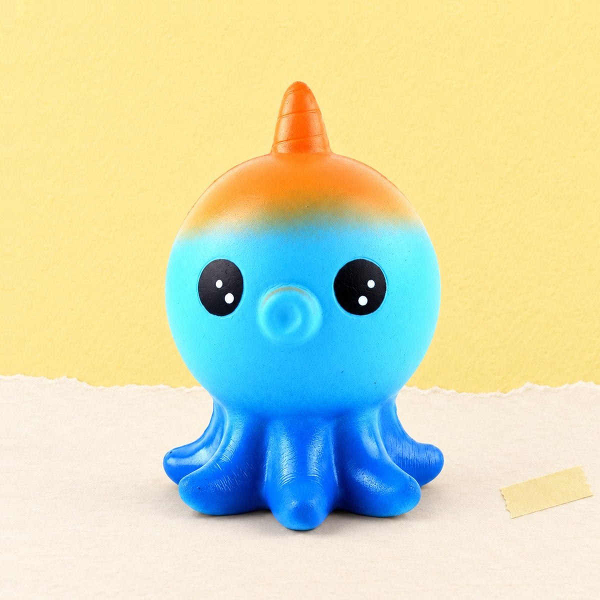 Octopus squishy slow rising op pastelkleurig papier