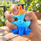Octopus Squishy, Slow Rising, being squeezed by hand, soft and squishy