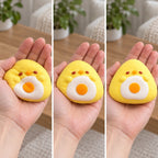 Onigiri squishy, squished flat, half risen and fully back in shape