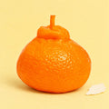 Orange squishy crunchy – Crunchy Orange Squishy, Realistic Fruit, product photo on pastel paper